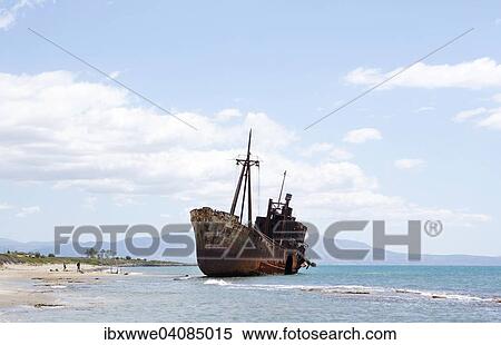 Stock Photography - Shipwreck on the sandy beach, near Gytheio, Peloponnese, Greece, Europe. Fotosearch