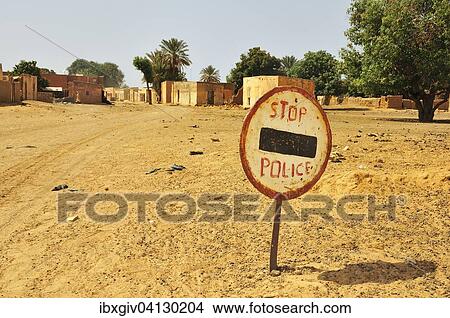 Picture - Sign, stop, police, border to Senegal, Lekseiba II, Brakna region, Mauritania, Africa. Fotosearch