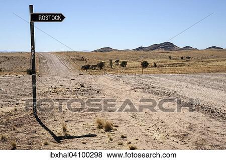 Signpost to Rostock at the road C14, Namibia, Africa View Large Photo Image Stock Photo - Signpost to Rostock at the road C14, Namibia, Africa. Fotosearch
