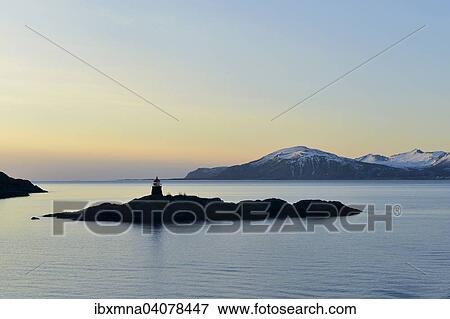 Silhouette of a small island with a lighthouse in the evening, Raftsund, Nordland, Vesteralen, Norway, Europe View Large Photo Image Stock Photo - Silhouette of a small island with a lighthouse in the evening, Raftsund, Nordland, Vesteralen, Norway, Europe. Fotosearch