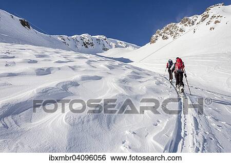Ski touring, during the ascent of Mt Seespitz at Deutschnonsberg, at the back the peak of Mt Seespitz, Proveis, Ulten Valley or Val d'Ultimo, South Tyrol, Italy, Europe View Large Photo Image Stock Photograph - Ski touring, during the ascent of Mt Seespitz at Deutschnonsberg, at the back the peak of Mt Seespitz, Proveis, Ulten Valley or Val d'Ultimo, South Tyrol, Italy, Europe. Fotosearch
