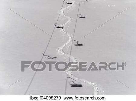 Ski track in deep snow with shadows from a chair lift, Venet, Zams, Tyrol, Austria, Europe View Large Photo Image Stock Photo - Ski track in deep snow with shadows from a chair lift, Venet, Zams, Tyrol, Austria, Europe. Fotosearch