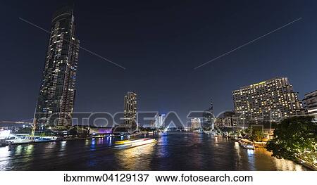 Skyline and boat on the river Mae Nam Chao Phraya, at night, Bangkok, Thailand, Asia View Large Photo Image Stock Photo - Skyline and boat on the river Mae Nam Chao Phraya, at night, Bangkok, Thailand, Asia. Fotosearch