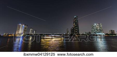 Skyline and boat on the river Mae Nam Chao Phraya, at night, Bangkok, Thailand, Asia View Large Photo Image Stock Photography - Skyline and boat on the river Mae Nam Chao Phraya, at night, Bangkok, Thailand, Asia. Fotosearch