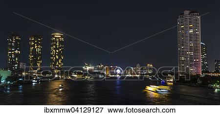 Skyline with Ferris wheel and boat on the river Mae Nam Chao Phraya, at night, Bangkok, Thailand, Asia View Large Photo Image Stock Photo - Skyline with Ferris wheel and boat on the river Mae Nam Chao Phraya, at night, Bangkok, Thailand, Asia. Fotosearch