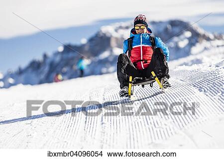 Sledding on Jochgrimm ridge, South Tyrol, Italy, Europe View Large Photo Image Picture - Sledding on Jochgrimm ridge, South Tyrol, Italy, Europe. Fotosearch