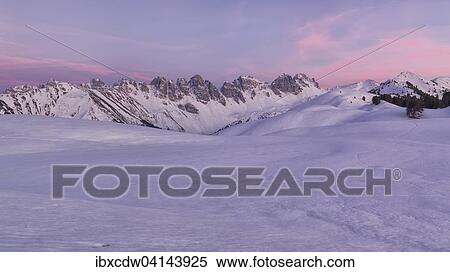 Snow-covered lake Salfeinssee on a winter evening, Kalkkogel mountains behind, Salfeins, Grinzens, Tyrol, Austria, Europe View Large Photo Image Stock Photography - Snow-covered lake Salfeinssee on a winter evening, Kalkkogel mountains behind, Salfeins, Grinzens, Tyrol, Austria, Europe. Fotosearch