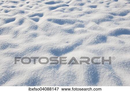 Snow in a meadow View Large Photo Image Stock Photo - Snow in a meadow. Fotosearch