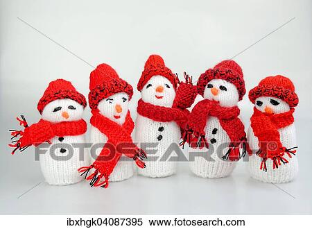 Stock Photography - Snowmen, hand-knitted. Fotosearch