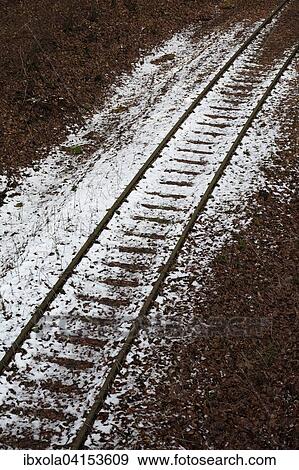 Snowy disused railway track, Hesse, Germany, Europe View Large Photo Image Stock Photo - Snowy disused railway track, Hesse, Germany, Europe. Fotosearch