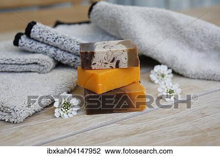 Soap pieces with flowers, terry towels View Large Photo Image Stock Image - Soap pieces with flowers, terry towels. Fotosearch