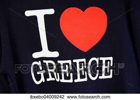 Souvenir T-shirt with the words " I love Greece", Oia, Santorini, Cyclades, Aegean Sea, Greece, Europe View Large Photo Image Stock Image - Souvenir T-shirt with the words " I love Greece", Oia, Santorini, Cyclades, Aegean Sea, Greece, Europe. Fotosearch