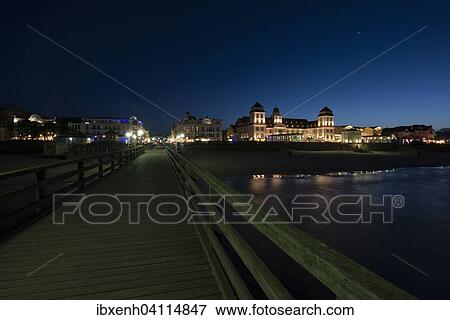 Spa hotel and pier at night, Binz, Ruegen, Mecklenburg-Western Pomerania, Germany, Europe View Large Photo Image Stock Photo - Spa hotel and pier at night, Binz, Ruegen, Mecklenburg-Western Pomerania, Germany, Europe. Fotosearch