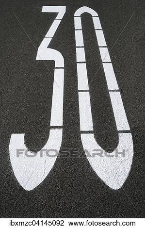 Speed-limit sign 30 kph on an asphalt road, Germany, Europe View Large Photo Image Stock Image - Speed-limit sign 30 kph on an asphalt road, Germany, Europe. Fotosearch