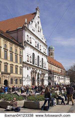 Stock Photo - St. Michael's Jesuit Church, Frauenkirche behind, pedestrian zone, Munich, Upper Bavaria, Bavaria, Germany, Europe. Fotosearch