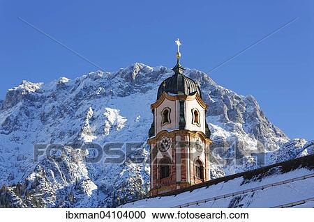 St. Peter and St. Paul's parish church, Mittenwald, Karwendel mountain behind, Werdenfelser Land, Upper Bavaria, Bavaria, Germany, Europe View Large Photo Image Stock Image - St. Peter and St. Paul's parish church, Mittenwald, Karwendel mountain behind, Werdenfelser Land, Upper Bavaria, Bavaria, Germany, Europe. Fotosearch