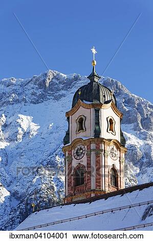 St. Peter and St. Paul's parish church, Mittenwald, Karwendel mountain behind, Werdenfelser Land, Upper Bavaria, Bavaria, Germany, Europe View Large Photo Image Stock Image - St. Peter and St. Paul's parish church, Mittenwald, Karwendel mountain behind, Werdenfelser Land, Upper Bavaria, Bavaria, Germany, Europe. Fotosearch