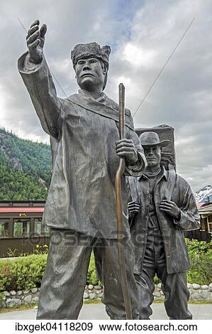 Statue of Native American showing gold diggers the way, Skagway, Alaska, USA View Large Photo Image Stock Photo - Statue of Native American showing gold diggers the way, Skagway, Alaska, USA. Fotosearch
