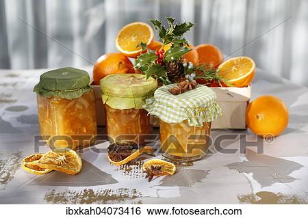 Still life with oranges, orange jam, holly, star anise View Large Photo Image Stock Photograph - Still life with oranges, orange jam, holly, star anise. Fotosearch