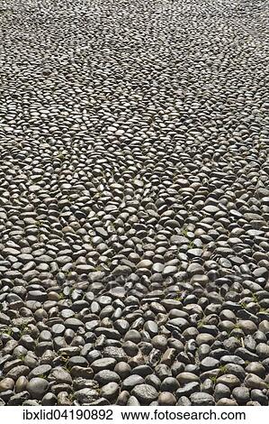 Stock Image - Stone paved road, Pavia, Lombardy, Italy, Europe. Fotosearch