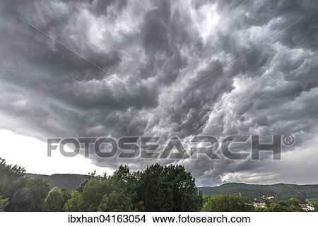 Picture - Storm clouds in St. Veit, Berndorf, Lower Austria, Austria, Europe. Fotosearch