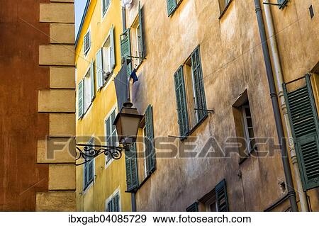Street lamp, house walls, Old Nice, Departement Alpes-Maritimes, Provence-Alpes-Cote d’Azur, France, Europe View Large Photo Image Stock Photo - Street lamp, house walls, Old Nice, Departement Alpes-Maritimes, Provence-Alpes-Cote d’Azur, France, Europe. Fotosearch