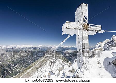 Summit cross on Mt Loffler, Zillertal Alps, Tauferer Ahrntal Valley, Puster Valley, South Tyrol, Italy, Europe View Large Photo Image Stock Image - Summit cross on Mt Loffler, Zillertal Alps, Tauferer Ahrntal Valley, Puster Valley, South Tyrol, Italy, Europe. Fotosearch