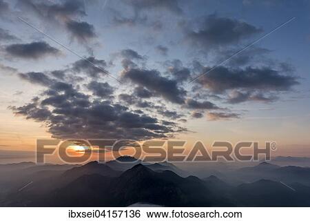 Sunrise above the Bavarian Alps, Herzogstand, Upper Bavaria, Bavaria, Germany, Europe View Large Photo Image Stock Photograph - Sunrise above the Bavarian Alps, Herzogstand, Upper Bavaria, Bavaria, Germany, Europe. Fotosearch