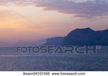Stock Photograph - Sunrise over the Tyrrhenian Sea, north coast, Sicily, Italy, Europe. Fotosearch
