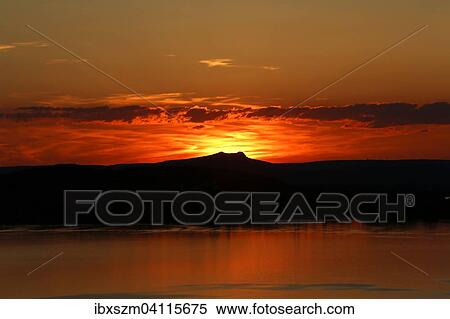 Sunset above Hegau volcano, Lake Constance, Canton of Thurgau, Switzerland, Europe View Large Photo Image Stock Photography - Sunset above Hegau volcano, Lake Constance, Canton of Thurgau, Switzerland, Europe. Fotosearch