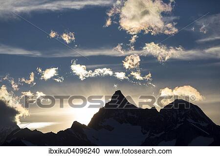 Sunset behind Ober Gabelhorn and Wellenkuppe, from the Berghaus Fluhalp, Zermatt, Canton of Valais, Switzerland, Europe View Large Photo Image Stock Image - Sunset behind Ober Gabelhorn and Wellenkuppe, from the Berghaus Fluhalp, Zermatt, Canton of Valais, Switzerland, Europe. Fotosearch