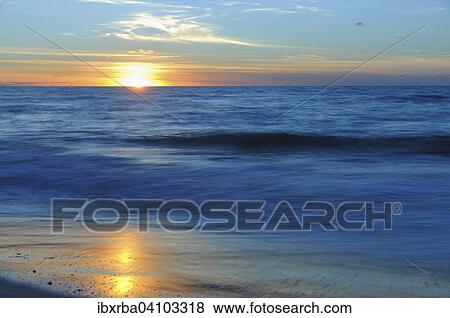 Sunset by the Baltic Sea, West beach, Darss, Western Pomerania Lagoon Area National Park, Mecklenburg-Western Pomerania, Germany, Europe View Large Photo Image Stock Photo - Sunset by the Baltic Sea, West beach, Darss, Western Pomerania Lagoon Area National Park, Mecklenburg-Western Pomerania, Germany, Europe. Fotosearch