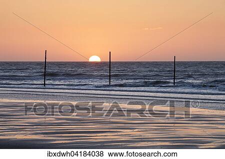 Sunset on the North Sea coast, Wangerooge, East Frisian Island, East Frisia, Lower Saxony, Germany, Europe View Large Photo Image Stock Photo - Sunset on the North Sea coast, Wangerooge, East Frisian Island, East Frisia, Lower Saxony, Germany, Europe. Fotosearch