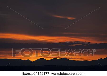 Sunset with silhouetted Vosges, Ringsheim, Baden-Wurttemberg, Germany, Europe View Large Photo Image Stock Photo - Sunset with silhouetted Vosges, Ringsheim, Baden-Wurttemberg, Germany, Europe. Fotosearch