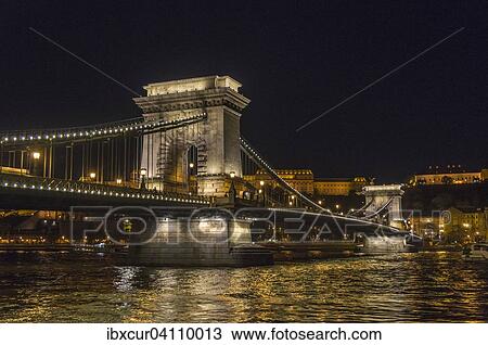 Stock Image - Szechenyi Chain Bridge at night, from the Pest side, Lipotvaros, Pest, Budapest, Hungary, Europe. Fotosearch