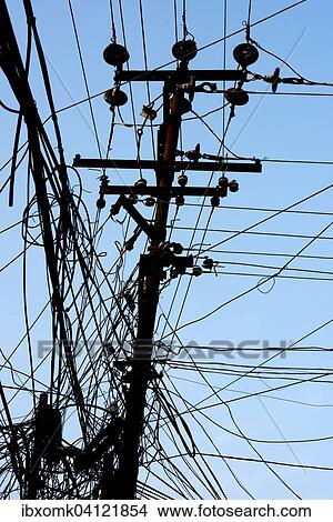 Tangled power cables on a power pole, Kochi, Kochi, India, Asia View Large Photo Image Picture - Tangled power cables on a power pole, Kochi, Kochi, India, Asia. Fotosearch