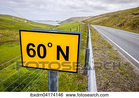 The 60th northern degree of latitude intersects the road A 970 on Mainland, Cunningsburgh, Shetland Islands, Scotland, United Kingdom, Europe View Large Photo Image Stock Photograph - The 60th northern degree of latitude intersects the road A 970 on Mainland, Cunningsburgh, Shetland Islands, Scotland, United Kingdom, Europe. Fotosearch