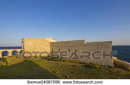 The ancient Castello Maniace castle, Piazza Federico de Sveia d'Ortigia, UNESCO World Heritage Site, Province of Syracuse, Ortigia, Sicily, Italy, Europe View Large Photo Image Stock Photograph - The ancient Castello Maniace castle, Piazza Federico de Sveia d'Ortigia, UNESCO World Heritage Site, Province of Syracuse, Ortigia, Sicily, Italy, Europe. Fotosearch