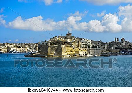 The fortified city of Senglea seen from the Grand Harbour of Valletta, Malta, Europe View Large Photo Image Stock Photo - The fortified city of Senglea seen from the Grand Harbour of Valletta, Malta, Europe. Fotosearch