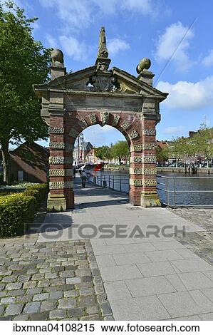 The historic harbor gate at Ratsdelft, Emden, East Frisia, Lower Saxony, Germany, Europe View Large Photo Image Stock Photography - The historic harbor gate at Ratsdelft, Emden, East Frisia, Lower Saxony, Germany, Europe. Fotosearch