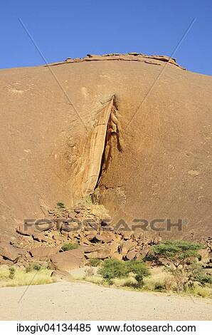Stock Photography - The labia of Aicha, weathered stone of the monolith, Adrar region, Mauritania, Africa. Fotosearch