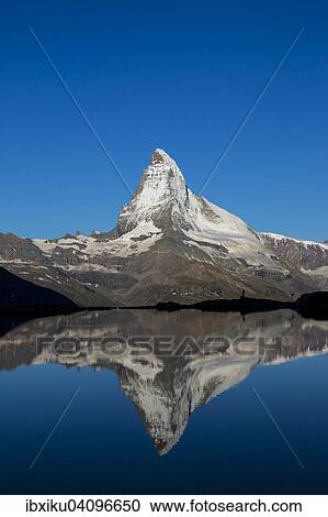 The Matterhorn with reflection in Stellisee lake, Zermatt, Canton of Valais, Switzerland, Europe View Large Photo Image Stock Image - The Matterhorn with reflection in Stellisee lake, Zermatt, Canton of Valais, Switzerland, Europe. Fotosearch