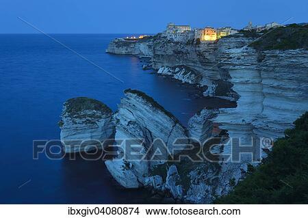 The medieval old town on the limestone cliff at dawn, Bonifacio, Corse-du-Sud, Corsica, France, Europe View Large Photo Image Picture - The medieval old town on the limestone cliff at dawn, Bonifacio, Corse-du-Sud, Corsica, France, Europe. Fotosearch