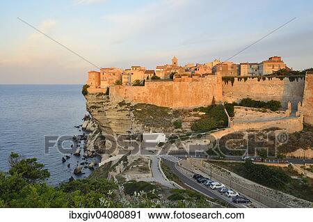 The medieval old town on the limestone cliff in the morning light, Bonifacio, Corse-du-Sud, Corsica, France, Europe View Large Photo Image Stock Image - The medieval old town on the limestone cliff in the morning light, Bonifacio, Corse-du-Sud, Corsica, France, Europe. Fotosearch