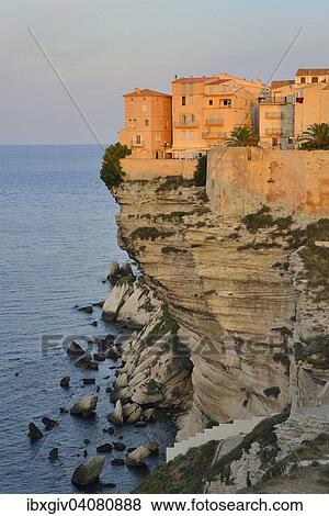 The medieval old town on the limestone cliff in the morning light, Bonifacio, Corse-du-Sud, Corsica, France, Europe View Large Photo Image Stock Photo - The medieval old town on the limestone cliff in the morning light, Bonifacio, Corse-du-Sud, Corsica, France, Europe. Fotosearch