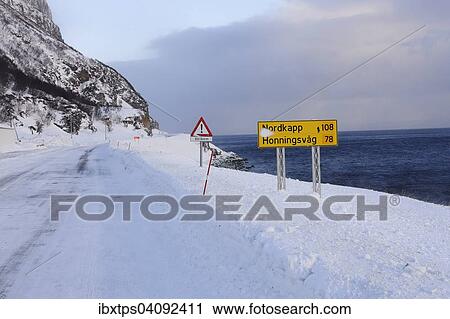 The snow-covered main road E69 on Porsangerfjord, Finnmark County, Norway, Europe View Large Photo Image Stock Image - The snow-covered main road E69 on Porsangerfjord, Finnmark County, Norway, Europe. Fotosearch