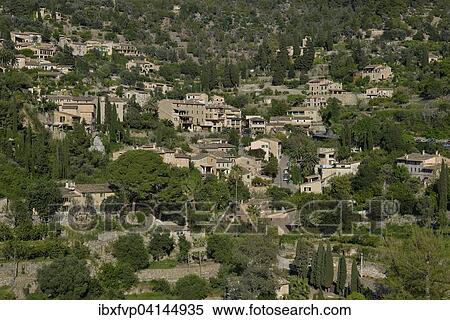The village of Deia, Serra de Tramuntana, Majorca, Balearic Islands, Spain, Europe View Large Photo Image Stock Photography - The village of Deia, Serra de Tramuntana, Majorca, Balearic Islands, Spain, Europe. Fotosearch