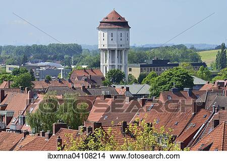 The water tower with its pointy tiled roof, rising above the houses in the city, Emden, East Frisia, Lower Saxony, Germany, Europe View Large Photo Image Picture - The water tower with its pointy tiled roof, rising above the houses in the city, Emden, East Frisia, Lower Saxony, Germany, Europe. Fotosearch
