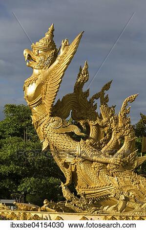 Thung Si Muang Park, Mueang, Garuda figure in front of the Golden Giant Candle, Candle Monument, Ubon Ratchathani, Isan, Isaan, Thailand, Asia View Large Photo Image Stock Image - Thung Si Muang Park, Mueang, Garuda figure in front of the Golden Giant Candle, Candle Monument, Ubon Ratchathani, Isan, Isaan, Thailand, Asia. Fotosearch