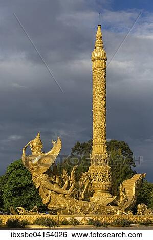 Thung Si Muang Park, Mueang, Garuda figure in front of the Golden Giant Candle, Candle Monument, Ubon Ratchathani, Isan, Isaan, Thailand, Asia View Large Photo Image Stock Photograph - Thung Si Muang Park, Mueang, Garuda figure in front of the Golden Giant Candle, Candle Monument, Ubon Ratchathani, Isan, Isaan, Thailand, Asia. Fotosearch